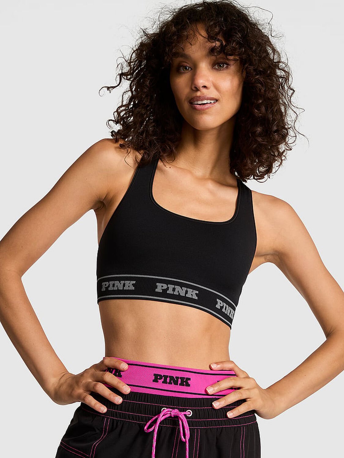 vs Pink Seamless Reversible Sports Bra Pure Black Rose Print 1 of 3 