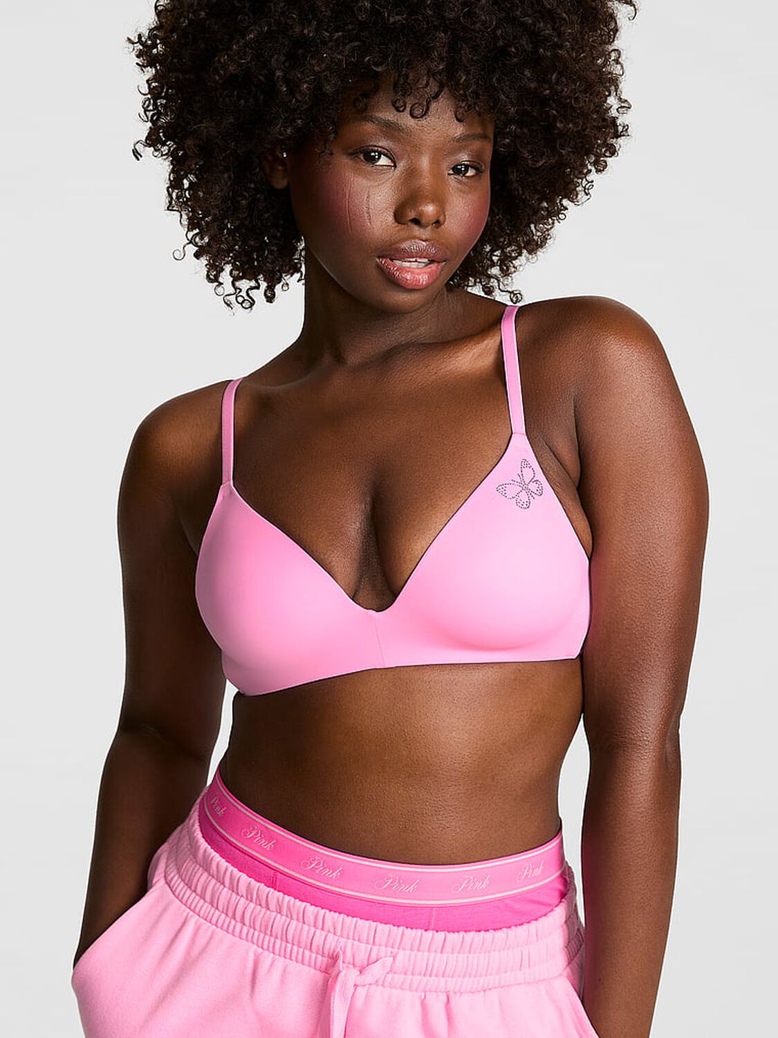 vs Pink Wear Everywhere Wear Everywhere Lightly Lined Wireless Bra Pink Lollipop Butterfly Bling 1 of 4 