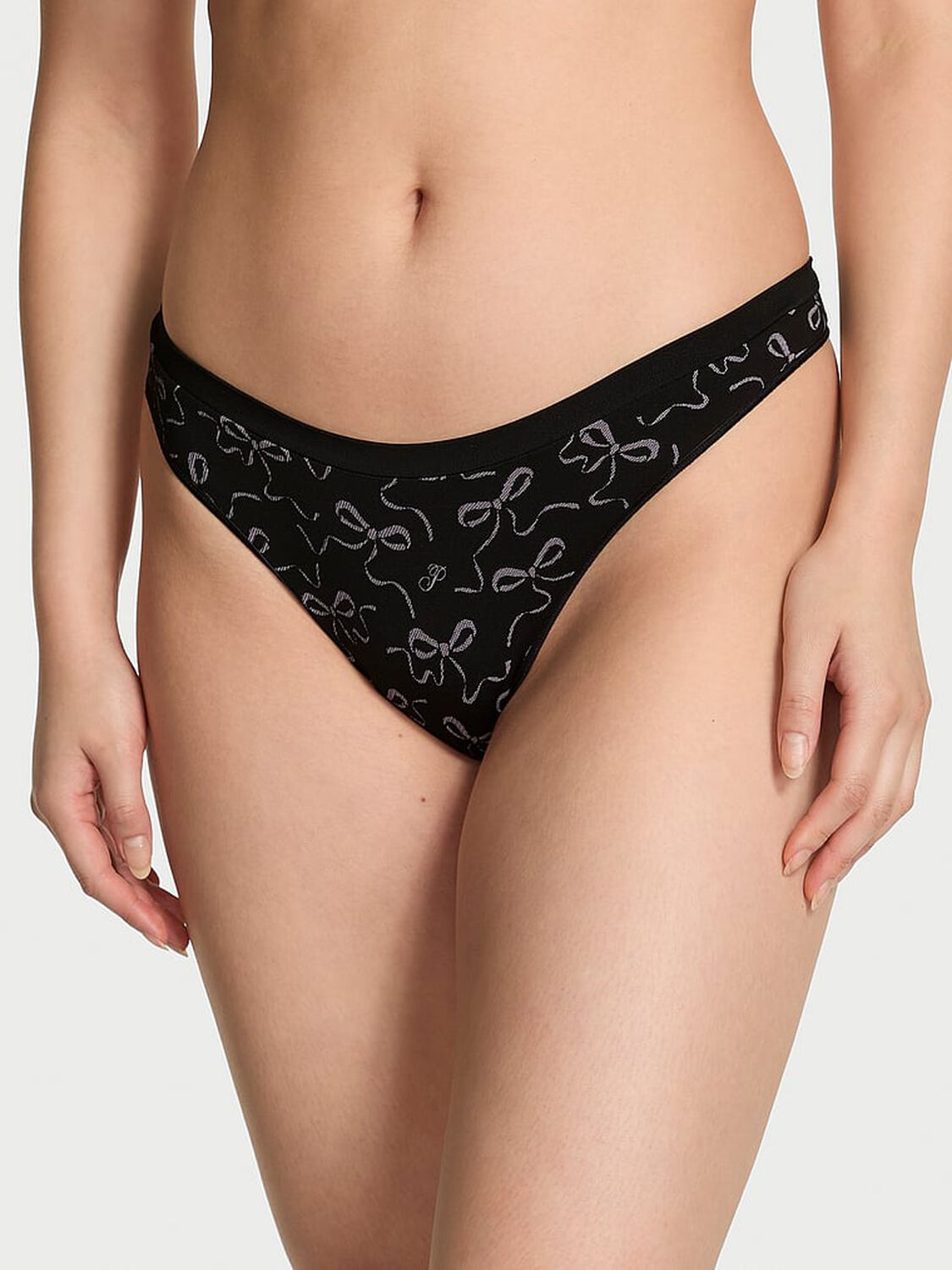 vs Pink Seamless High-Leg Thong Panty Black Bow Print 1 of 3 