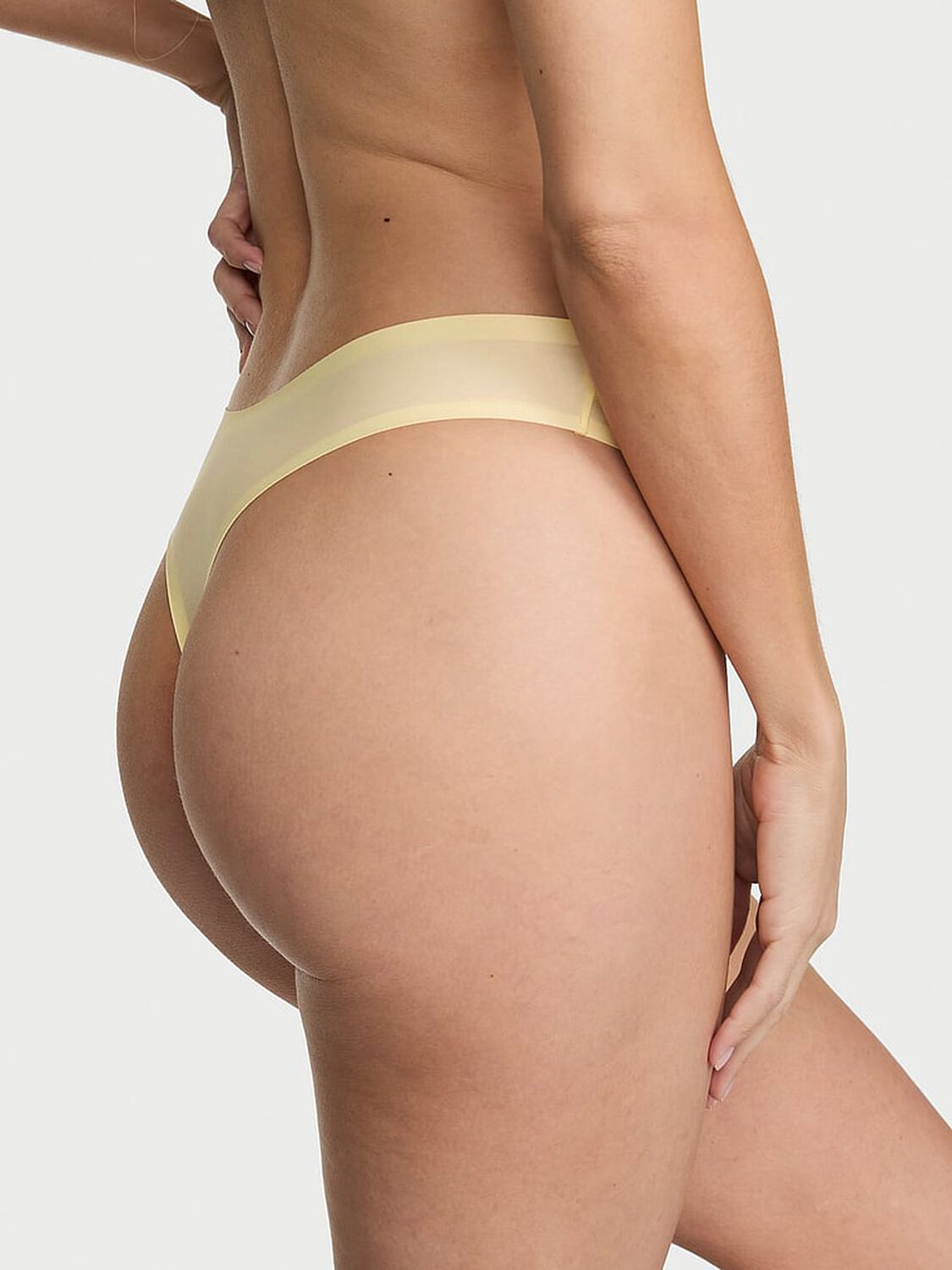 vs Body By Victoria Body by Victoria Flex Mid-Rise Thong Panty Sunny Honey 2 of 2 