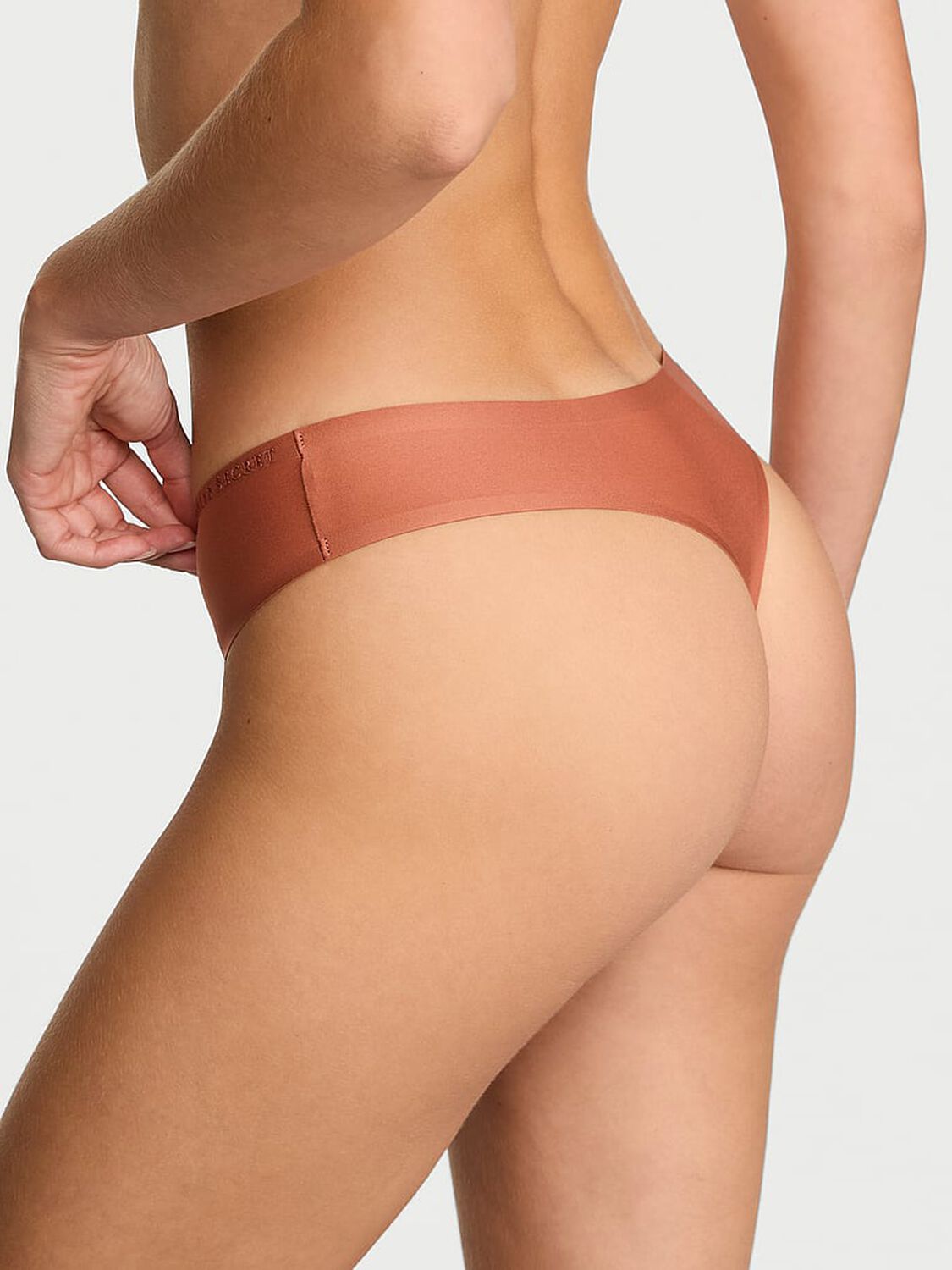 vs Body By Victoria Body by Victoria Flex Mid-Rise Thong Panty Copper Brown 2 of 3 