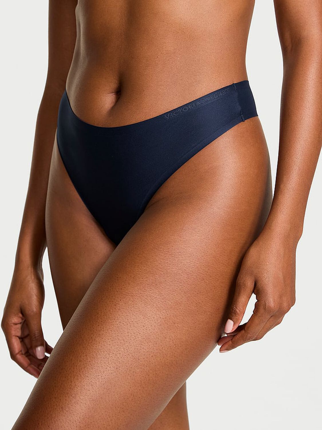 vs Body By Victoria Body by Victoria Flex Mid-Rise Thong Panty Noir Navy 1 of 2 