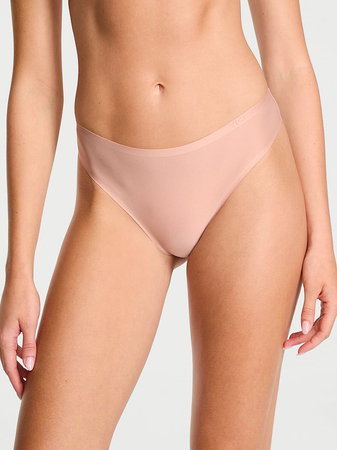 vs Body By Victoria Body by Victoria Flex Mid-Rise Thong Panty Macaron 1 of 1 