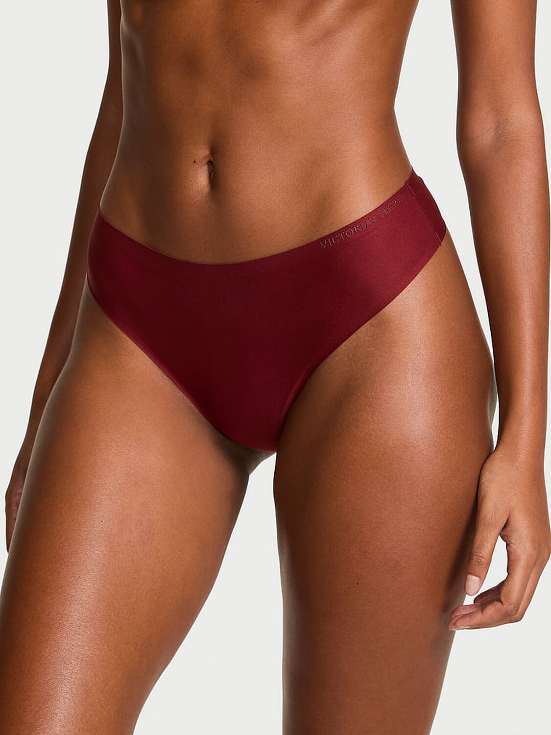 vs Body By Victoria Body by Victoria Flex Mid-Rise Thong Panty Sangria Red 1 of 2 