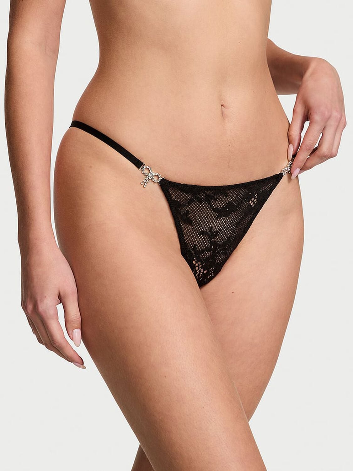 vs Dream Angels Twinkle Bow Lace Thong Panty Black 1 of 3 