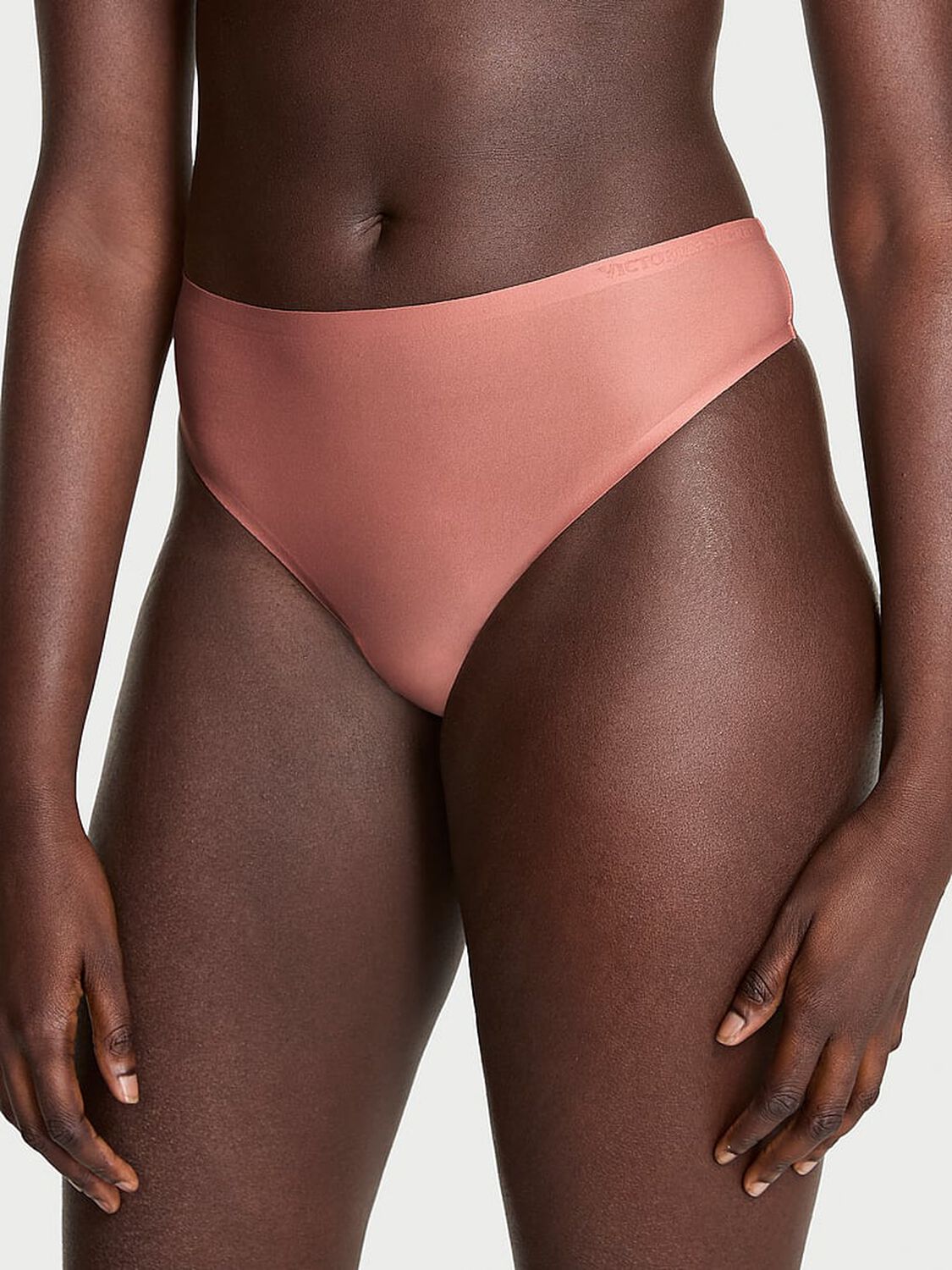 vs Body By Victoria Body by Victoria Flex Mid-Rise Thong Panty Desert Blush 1 of 3 