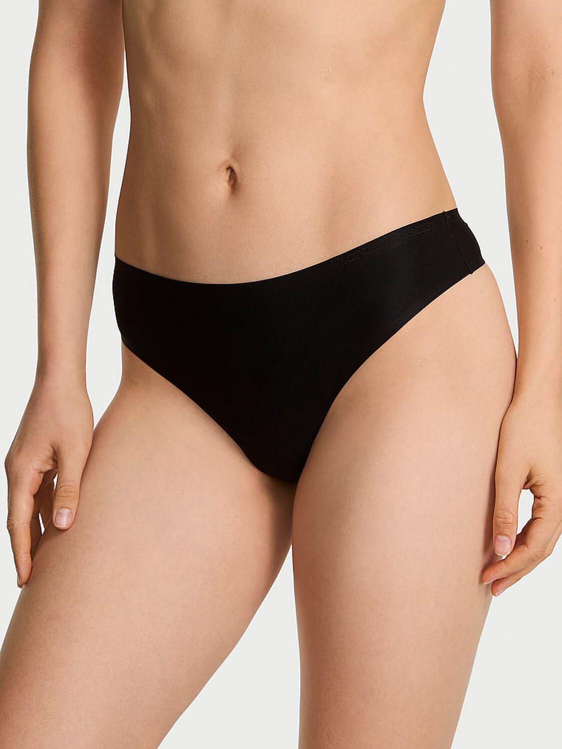 vs Body By Victoria Body by Victoria Flex Mid-Rise Thong Panty Black 1 of 3 