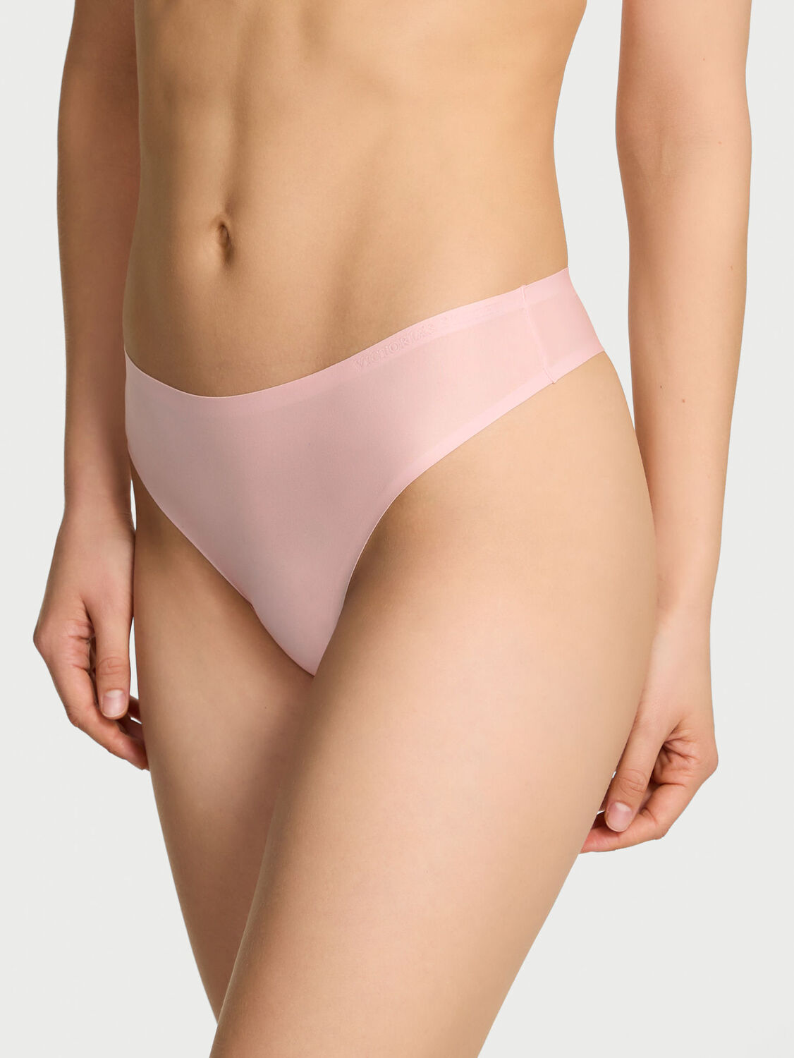 vs Body By Victoria Body by Victoria Flex Mid-Rise Thong Panty Angel Pink 1 of 3 